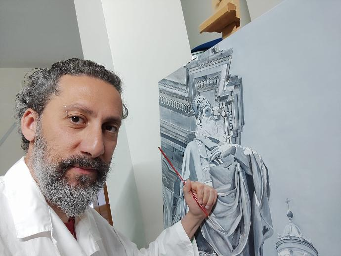 Salvatore Ingala realizzando un dipinto